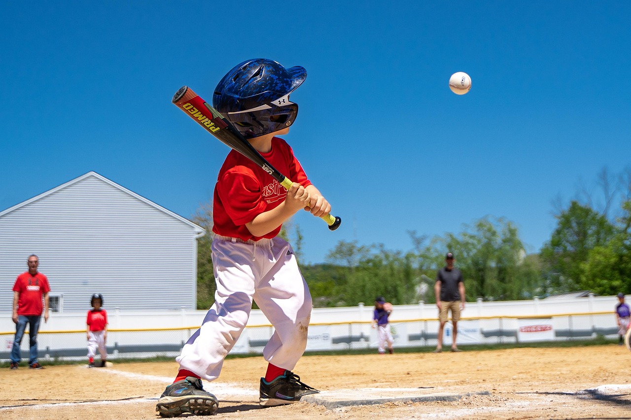Kids playing little league youth baseball